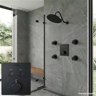 Luxury shower design with matte black rainfall shower head and frameless glass